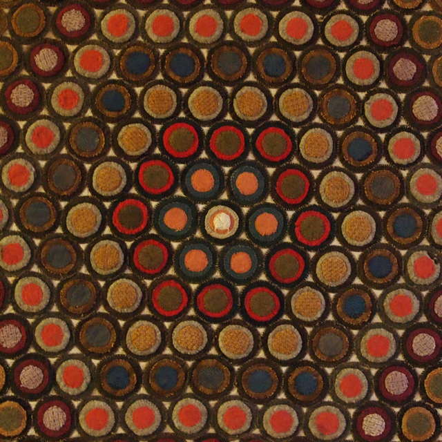 mounted penny rug concentric rows