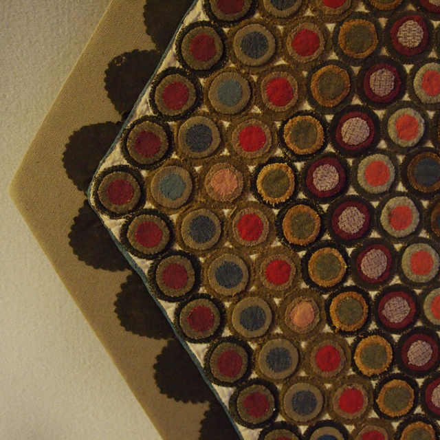 mounted penny rug hexagonal form