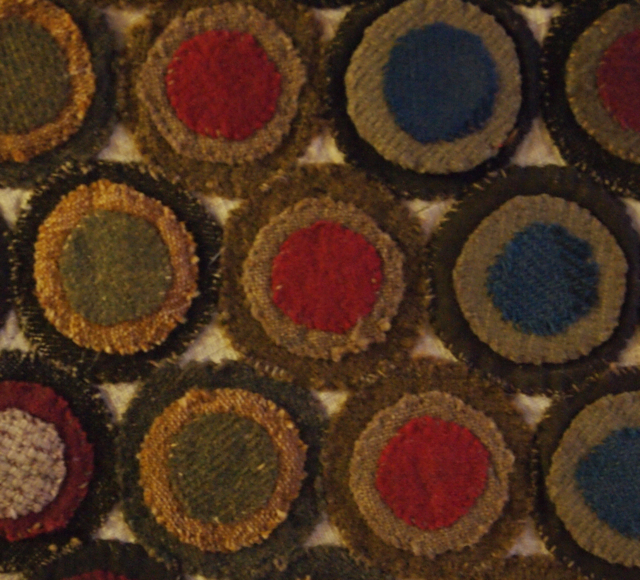 mounted penny rug appliqued circles
